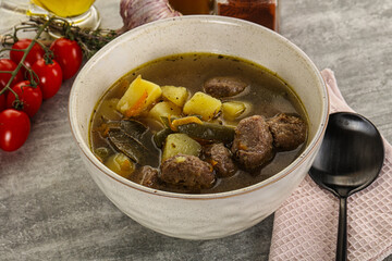Soup with meatball and potato