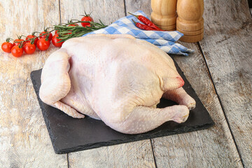 Whole raw chicken for cooking