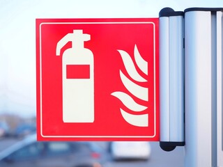 Fire extinguisher sign in outdoors car park