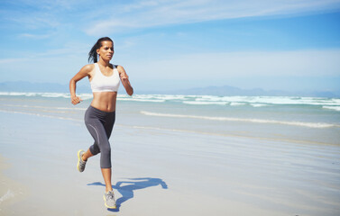 Fitness, space or Indian woman at sea running for exercise, training or outdoor workout at beach....
