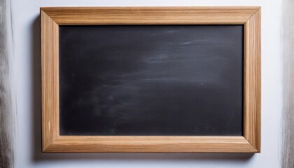 blank blackboard in wooden frame on or white background