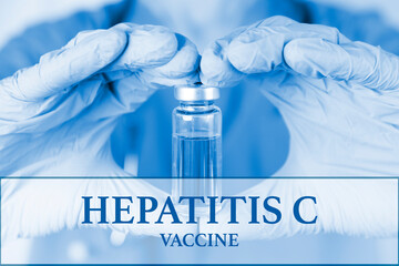 Hepatitis C vaccine. medical ampoule in the hands of a doctor. Vaccination awareness concept. Toned...