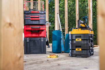 Construction Site Power Tools Inside Plastic Containers