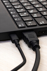 Connector for connecting a monitor to a laptop