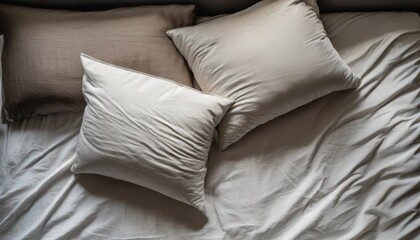 soft pillows on comfortable bed top view