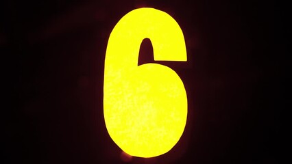 Sign template isolated on black background. Neon yellow six number figure symbol glowing with water waves moving over icon with ripples. - Powered by Adobe