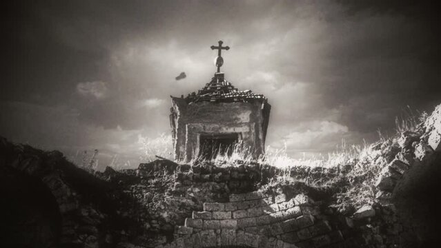 Old Church Ruin Vintage Film Texture Cloudy Sky Tracking Shot. Ruins of an old church on top of a hill, retro film texture. Tracking shot, black and white