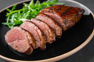 duck breast meat fried tasty fresh  eating cooking appetizer meal food snack on the table copy space food background rustic top view