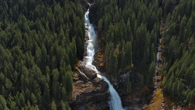 Aerial view of Krimml Waterfalls on sunny day. High Tauern National Park, Austrian Alps, Austria, 4k
