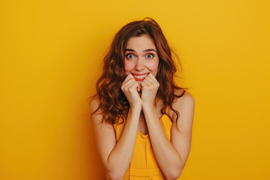 Nervous woman in studio with oops reaction on yellow background. Mistake, sorry and female overwhelmed by fake news, drama or secret with regret.