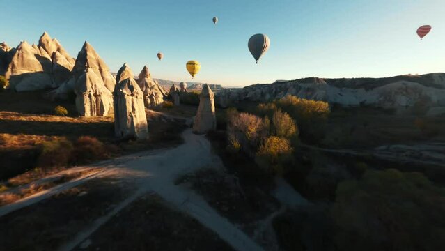 Aerial drone view of the natural beauty of Valley in Cappadocia, Turkey. Famous destination for hikers to explore the Rock Sites of Cappadocia.
