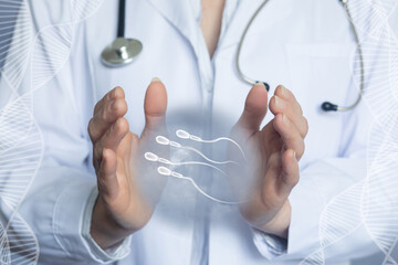 Doctor shows I sperm against a blurred background. - obrazy, fototapety, plakaty