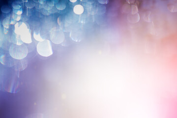 abstract pastel background with defocused light particles and a place for text