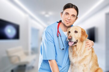 Happy vet doctor in uniform with little dog