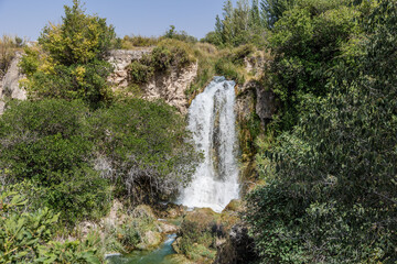 Fototapeta na wymiar Lagunas de Ruidera located in Albacete Spain, with turquoise waters and blue sky