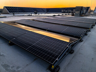 Solar panels covered with frost on a sunny frosty day at sunrise
- 729585765