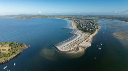 Aerial: Harbour and sandspit in Omaha Beach, Warkworth, New Zealand. - obrazy, fototapety, plakaty
