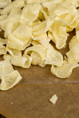 crispy potato chips with spices on the table