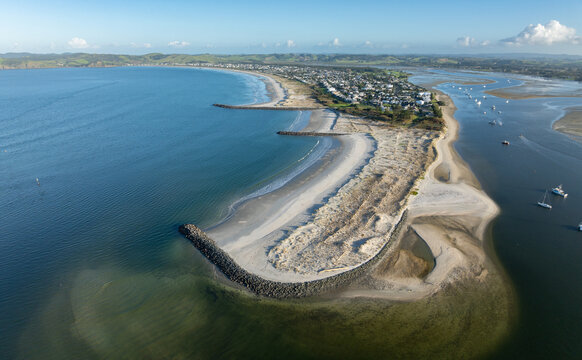 Aerial: Harbour and sandspit in Omaha Beach, Warkworth, New Zealand.