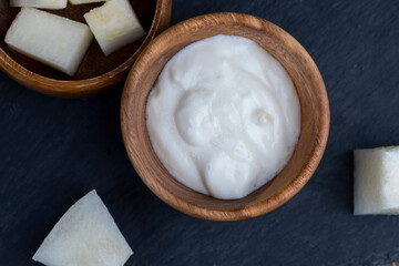 yogurt with melon flavor and ripe and delicious melon close-up