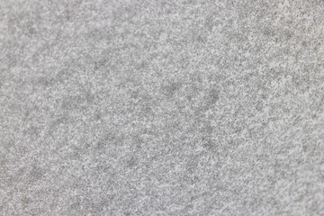 car glass covered with snow during a snowfall