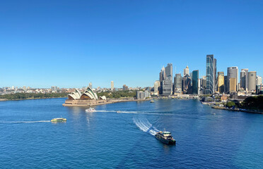 View of Sydney Harbour, Australia. Sydney Opera House and iconic buildings on the island. Panorama...