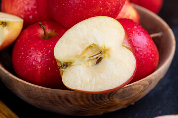 red ripe apples on the table, wet apples