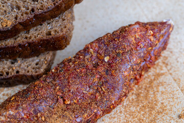 very spicy pork meat with red hot pepper on the table