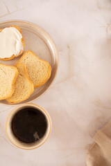 Toast with cream cheese in a marbled background in aerial view mockup