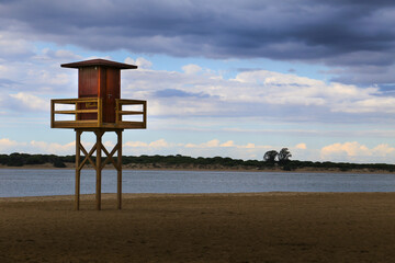 Wooden Lifeguard tower on the mouth of The Guadalquivir River in Sanlucar de Barrameda