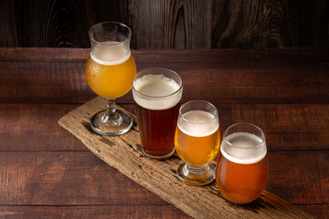 Craft beer. Different glasses of beer on the table.