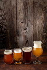 Craft beer. Different glasses of beer on the table.