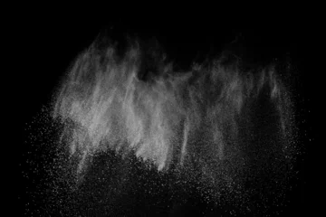 Foto op Plexiglas Abstract white dust on black background. Light smoke texture. Powder explosion. Splash water overlay.   © sergio34