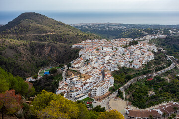 Fototapeta na wymiar Spain, Andalucia, white city Frigiliana aerial view from big mountain