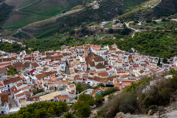 Fototapeta na wymiar Spain, Andalucia, white city Frigiliana aerial view from big mountain