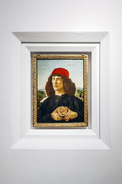 Florence, Italy - 29 December, 2023: Portrait of a Man with a Medal of Cosimo the Elder, by Botticelli, in the Uffizi Gallery