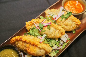 Hand-Crimped Empanadas with Fresh Garnish and Salsas