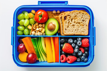 Blue lunch box with useful food for lunch and snack: sandwich, vegetables and fruits on white. healthy food, snack for adults and kids.