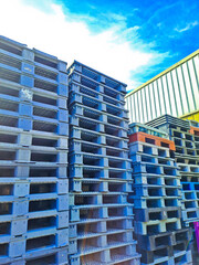 stack of wooden pallets for logistic shipments
