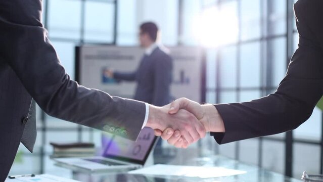 Congratulations on a successful deal with a handshake