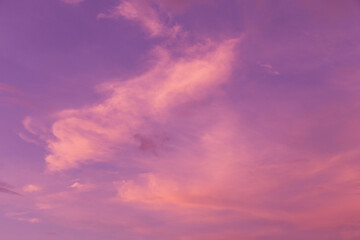 Epic Dramatic soft sunrise, sunset pink purple violet sky with clouds in sunlight background texture