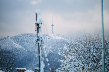 Mount Kopitoto in Sofia, Bulgaria. Snow covering the mountain hills and traffic posts. Beautiful winter landscape.
