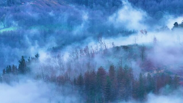 Aerial drone view of the winter landscape around the town of Gainza and Amezqueta and the Txindoki Mountain. Aralar Mountain Range. Goierri region. Gipuzkoa. Basque Country. Spain. Europe
