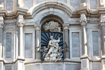 Fototapeta na wymiar Fragment of St. Agatha Cathedral (or Duomo) at Piazza Duomo in Catania, Italy, Sicily