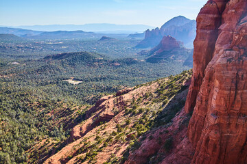 Aerial View of Sedona Red Rock Formations and Forested Valley