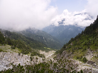 Mountain landscape with fog and clouds. Olympus mountain, Greece 