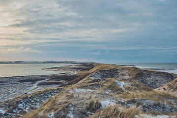 Coast at Vejlby klit in denmark in winter with snow. High quality photo