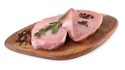 Wooden board with pieces of raw pork meat and spices isolated on white