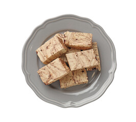 Pieces of tasty chocolate halva isolated on white, top view