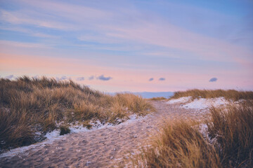 Pathway to the beach during evening in winter. High quality photo - 729653558